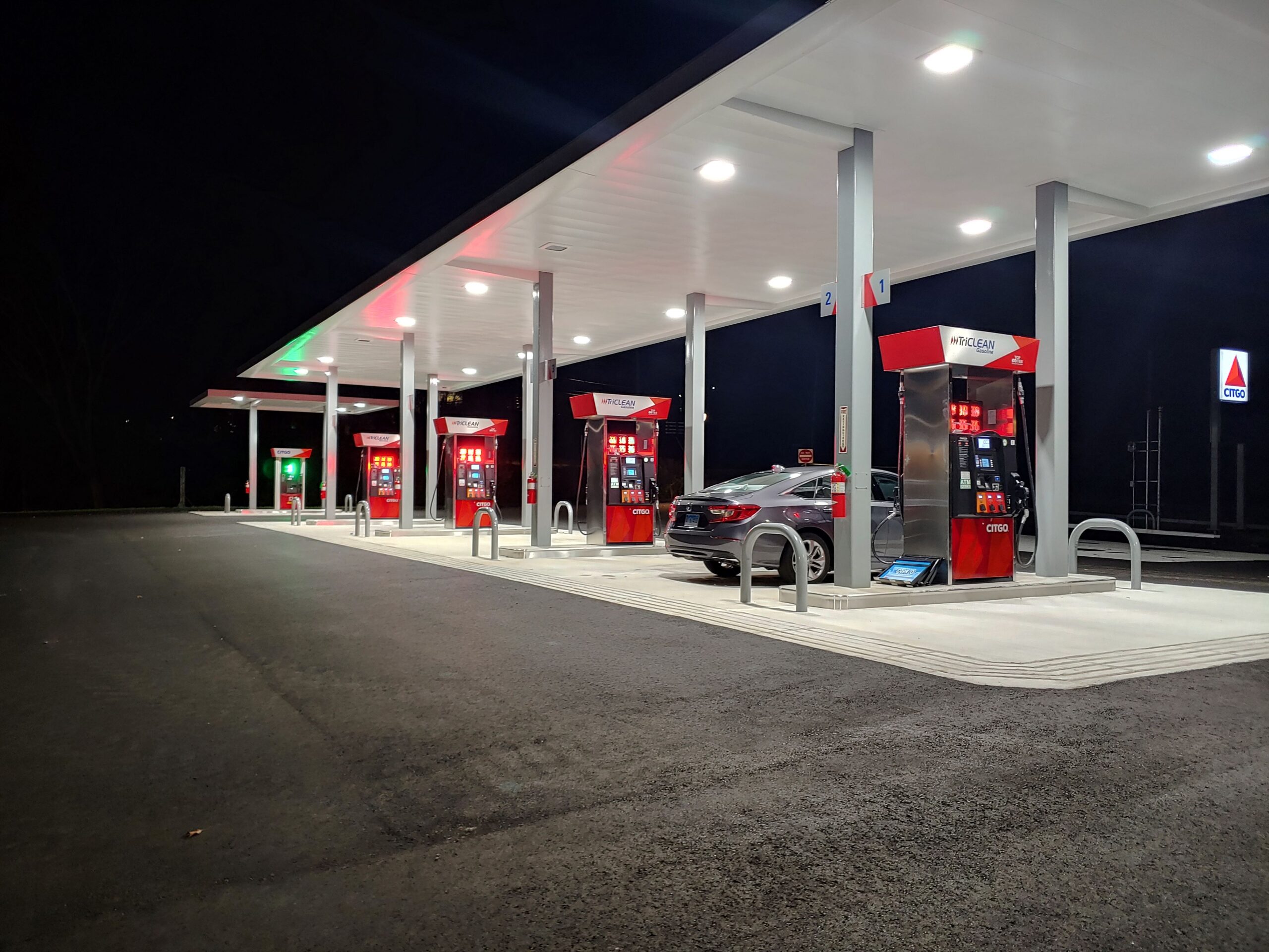 GAS Stations LED Digital Price Signs .GAS Stations- LED Digital Price Signs.LED Gas Station Pump Toppers.LED petrol pump toppers displaying fuel prices and promotional ads at a modern fuel station.led signs