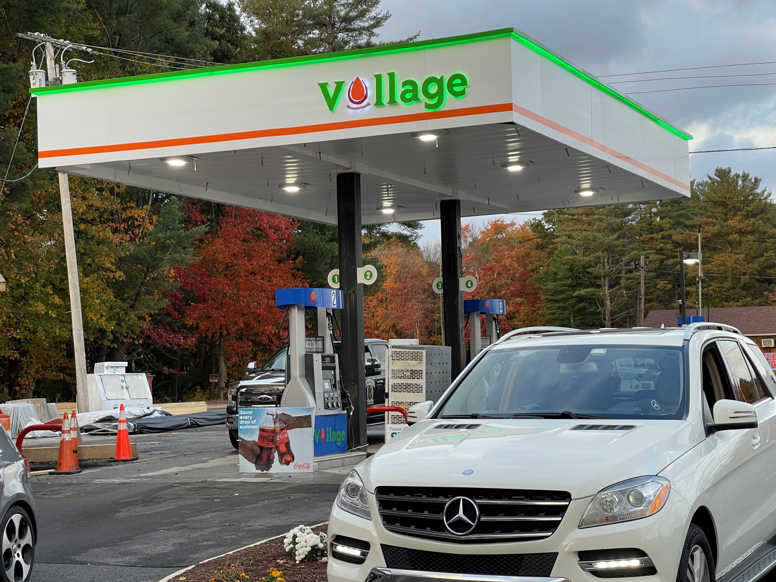 GAS Stations LED Digital Price Signs .GAS Stations- LED Digital Price Signs.LED Gas Station Pump Toppers.LED petrol pump toppers displaying fuel prices and promotional ads at a modern fuel station.led signs