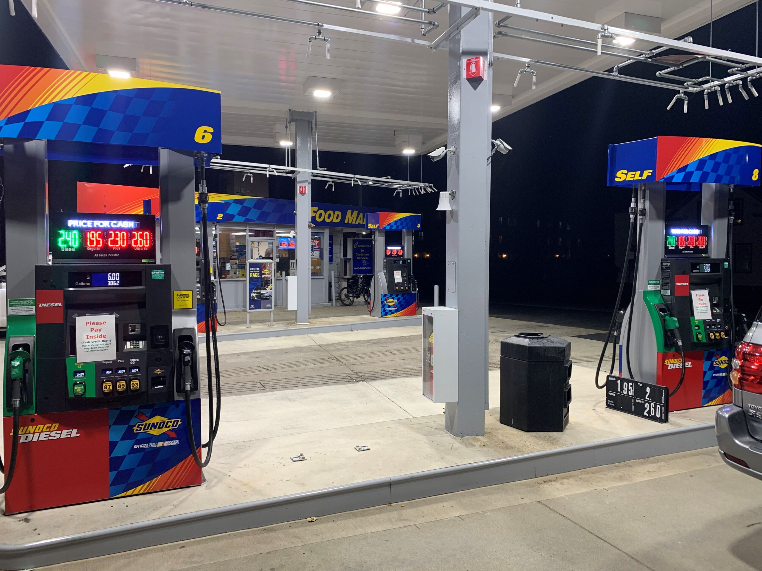 GAS Stations LED Digital Price Signs .GAS Stations- LED Digital Price Signs.LED Gas Station Pump Toppers.LED petrol pump toppers displaying fuel prices and promotional ads at a modern fuel station.led signs