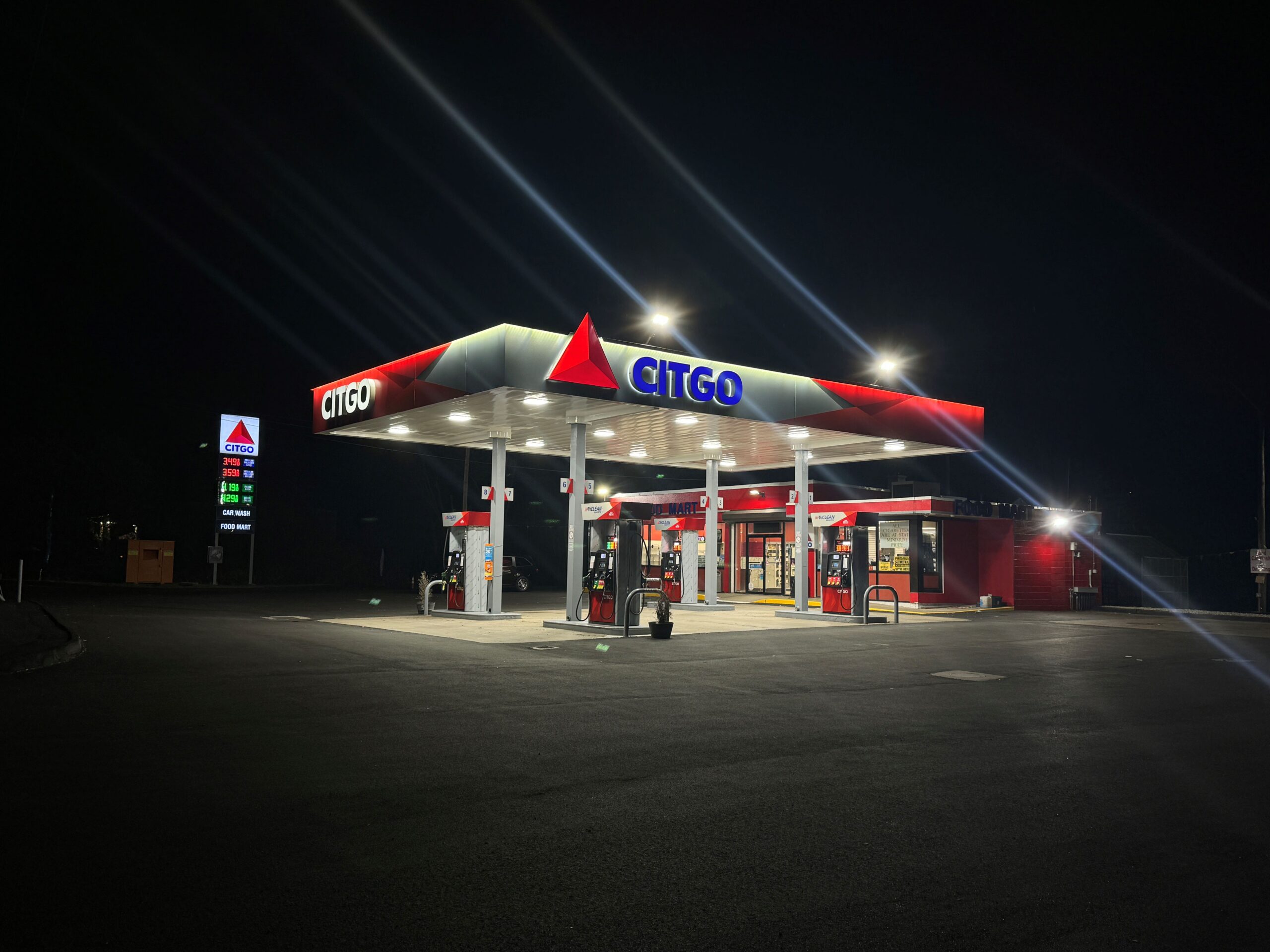 GAS Stations LED Digital Price Signs .GAS Stations- LED Digital Price Signs.LED Gas Station Pump Toppers.LED petrol pump toppers displaying fuel prices and promotional ads at a modern fuel station.led signs