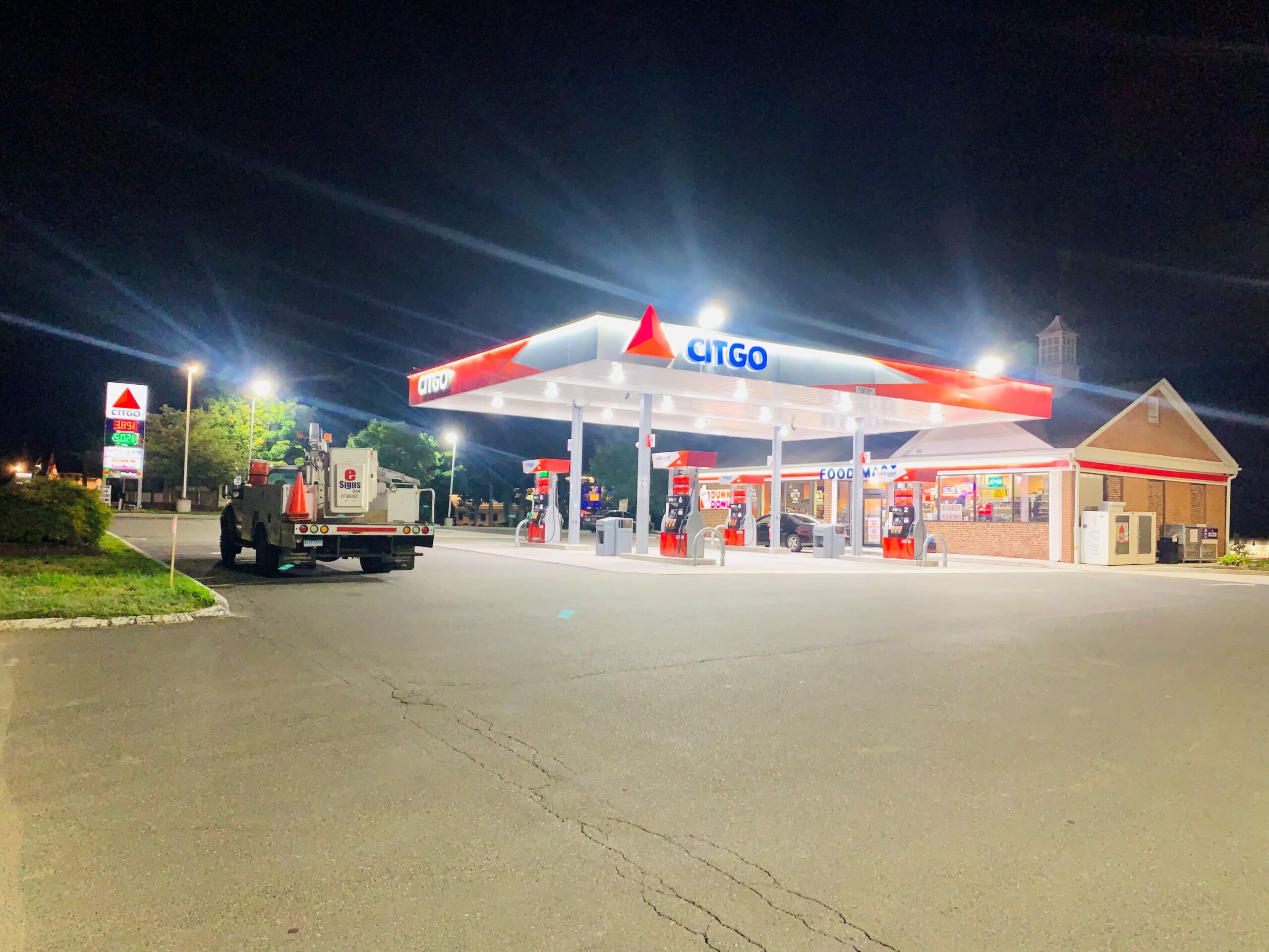 GAS Stations LED Digital Price Signs .GAS Stations- LED Digital Price Signs.LED Gas Station Pump Toppers.LED petrol pump toppers displaying fuel prices and promotional ads at a modern fuel station.led signs